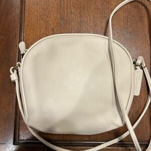 Elegant Cream Coach Crossbody Bag